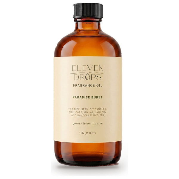 Paradise Burst fragrance oil in an amber glass bottle